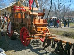 Chuck wagon with people - SADDLE UP RIDES INTO PIGEON FORGE