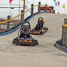 Carts on wooden track - THE TRACK IN PIGEON FORGE SAYS "COME RIDE WITH US!"