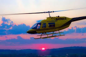 Helicopter setting sun - Scenic Helicopter Tours Smoky Mountains