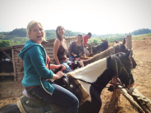 Smiling girls on horses 300x225 - Jayell Ranch Pigeon Forge Adventures
