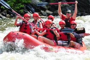 smo smiling family 300x199 - Smoky Mountain Outdoors provides rafting adventures