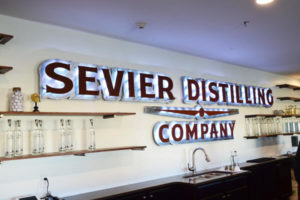 sevier distilling company logo wall 300x200 - National Moonshine Day 2018